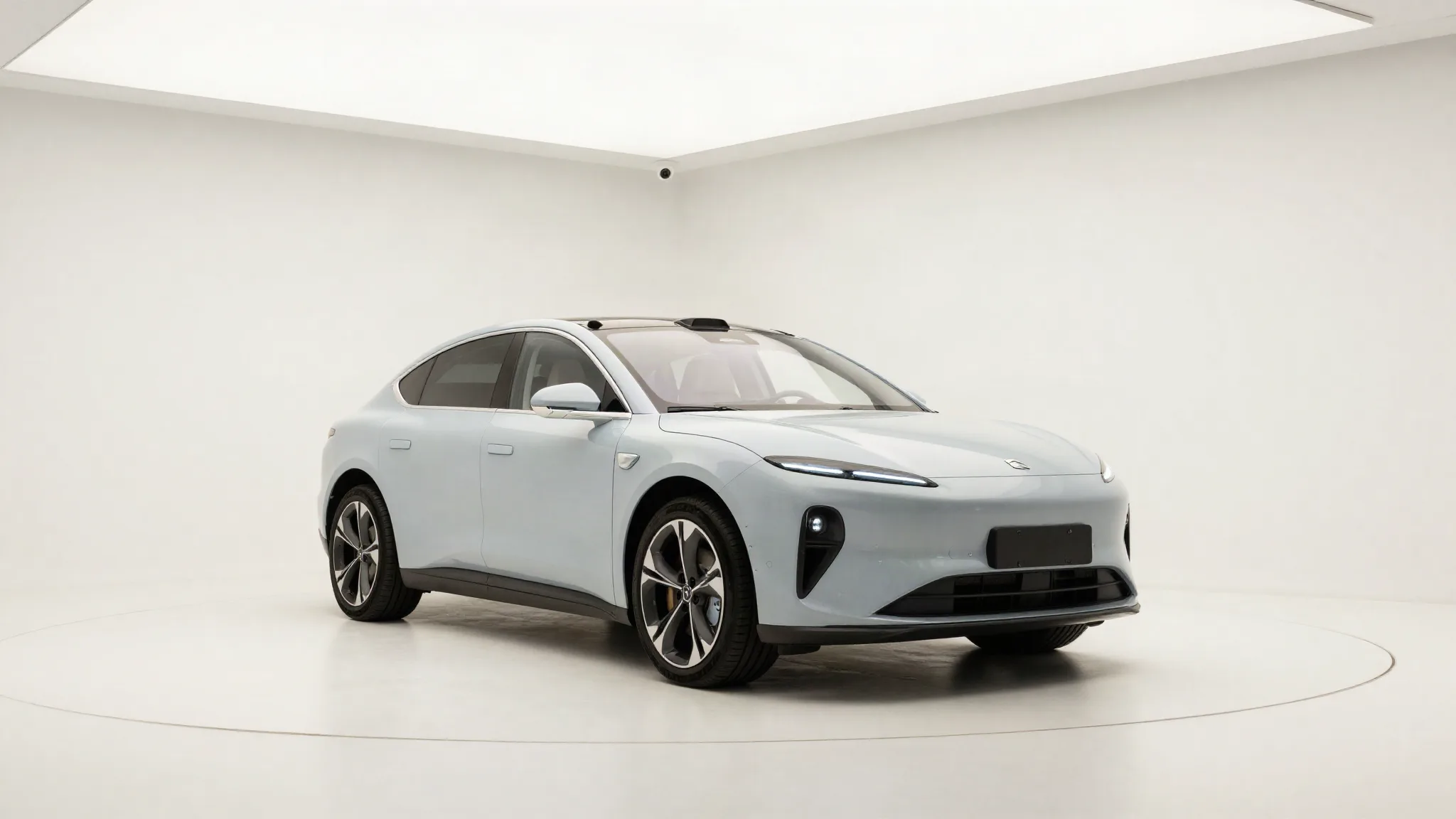 An electric car photographed in the EV-X inspection bay